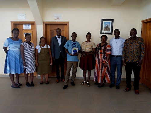 Group photo of Amuru community team with partners